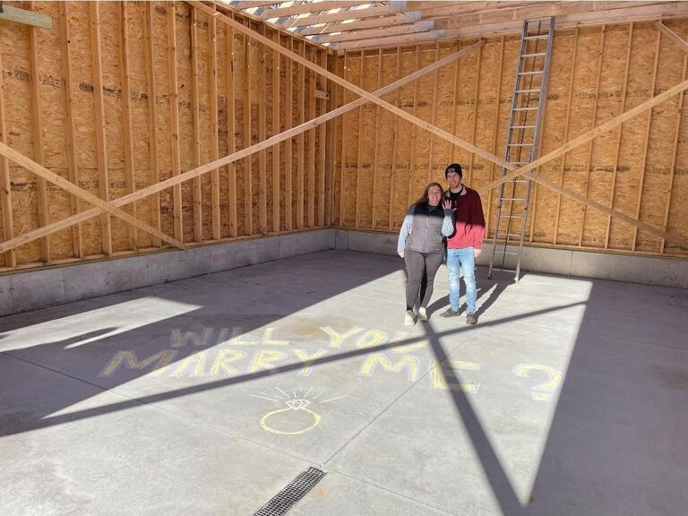 Engaged! Teddy proposed at the future home of their garage. 