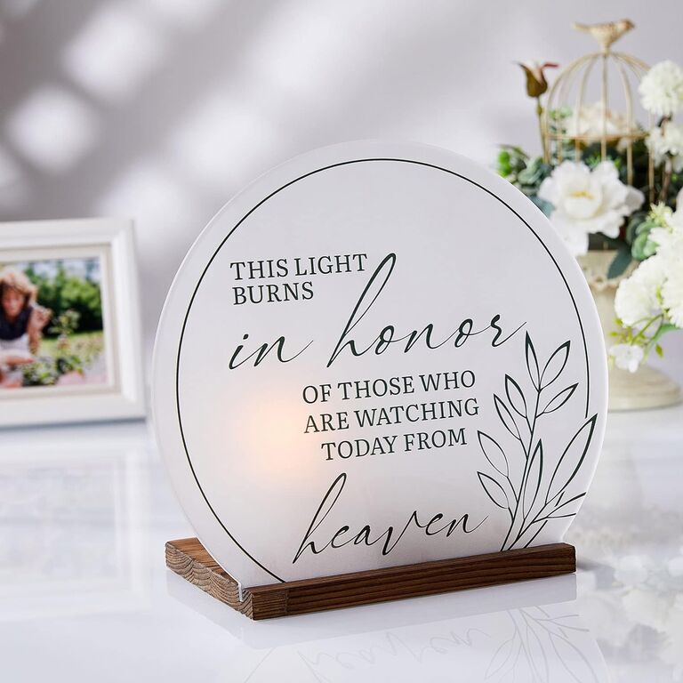 Backlit candle sign with writing
