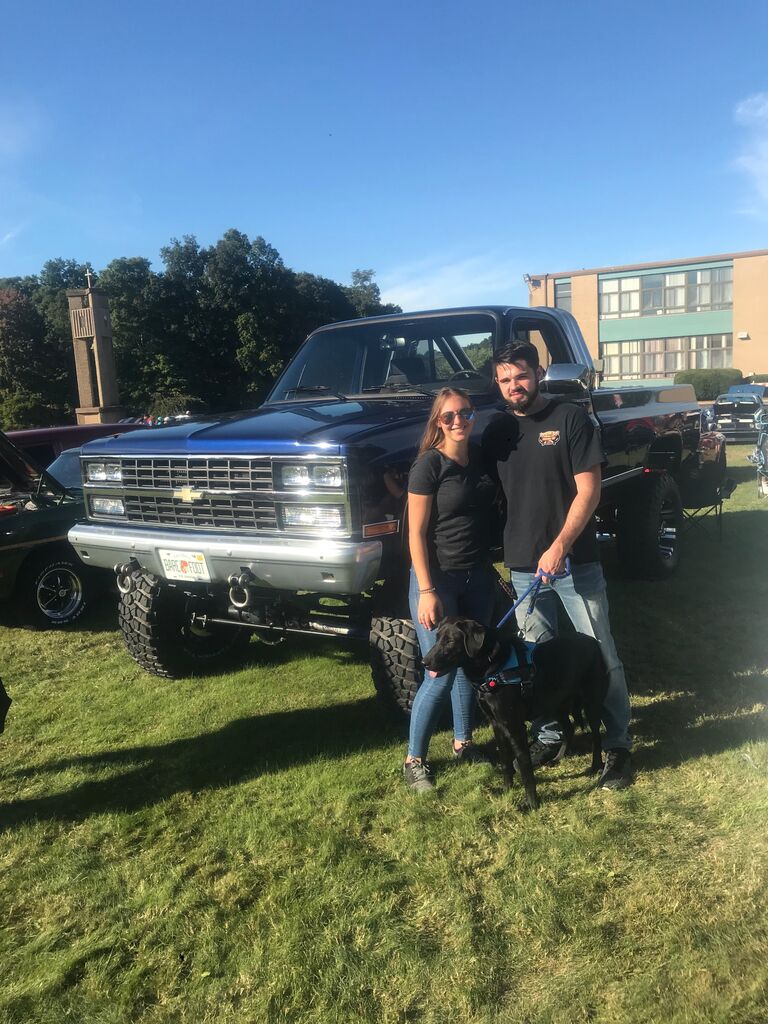 1 Year Anniversary. American Muscle Car Club Christmas in the Village Car Show 2019. Where the two had met only a year ago!