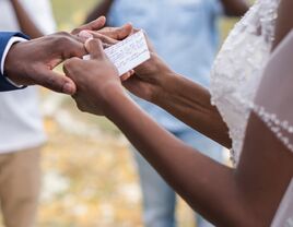 Couple reciting vows during wedding ceremony