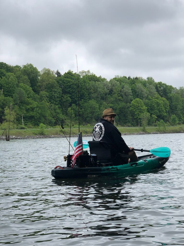 Our first adventure out on Delta Lake.  He was fishing and I was just kayaking around.  Josh only caught his gear because he tipped his kayak! The night before, we were loading the kayaks on top of my car in the dark and ended up breaking the mirror! We didn't notice until morning and had to zip tape it back onto my car.