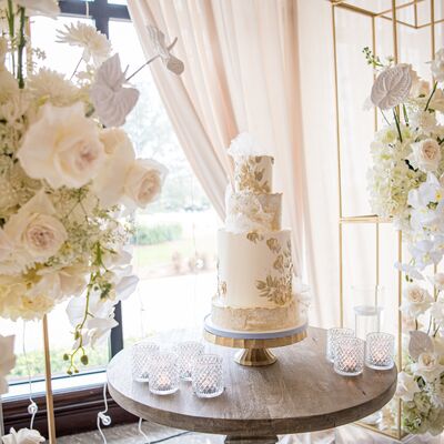 Cakes by Lynzie - Loved this wedding cake with gold leaf detail and  beautiful flowers from @boutiquebloomsdublin #weddingcake #weddingsireland  #wedding #goldleaf