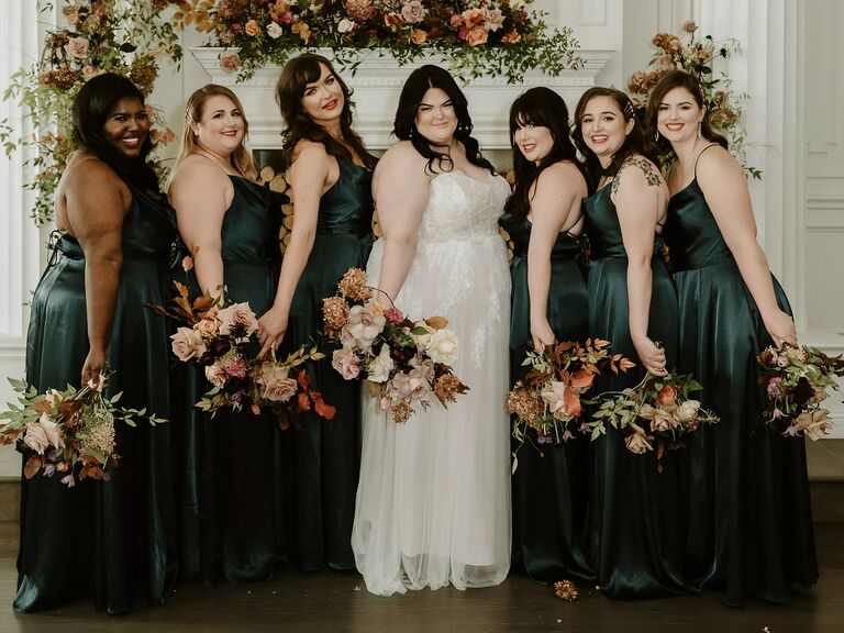 real wedding photo of emerald green winter bridesmaid dresses