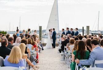 Couple exchanging their vows along the marina