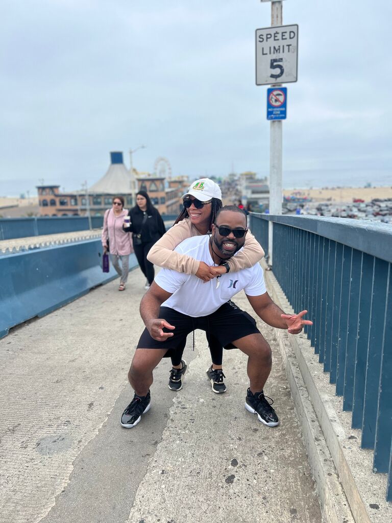 Showing Maurice around the famous Santa Monica Pier.