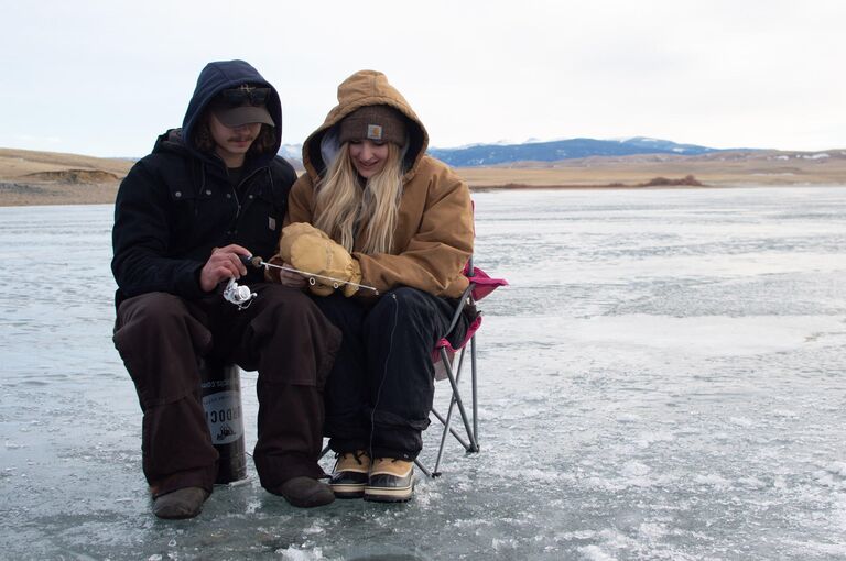 Their second Winter together came around and Colton started showing Sarah some of his hobbies. She was better than him immediately and caught 100% more fish than him.
