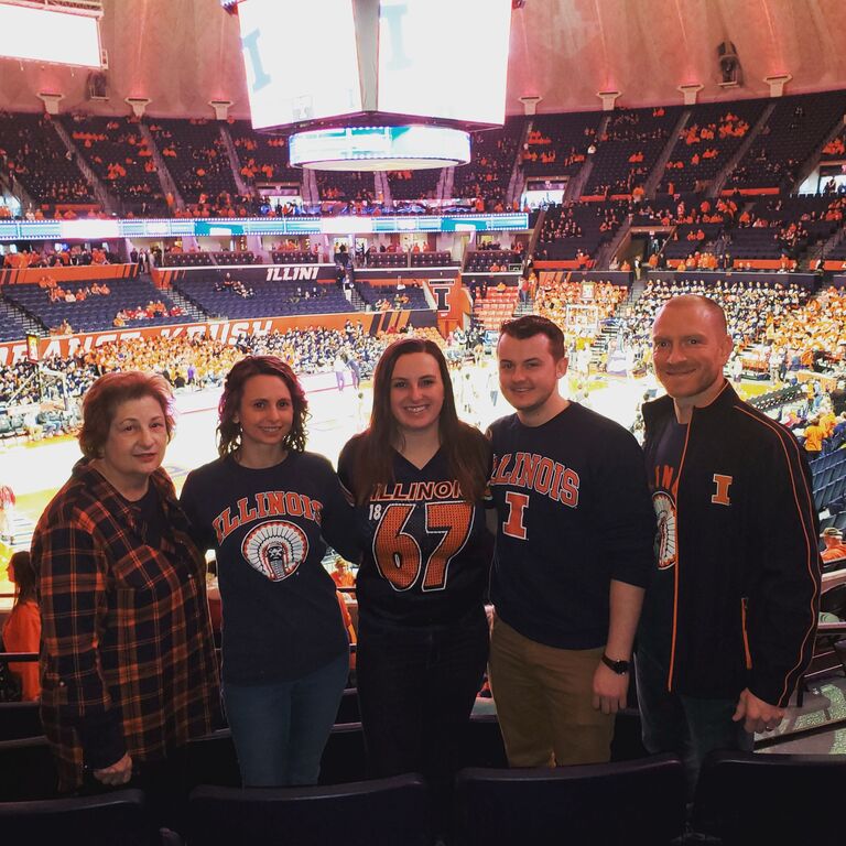 In their last outing before the pandemic shut down the world, Tim and Carolyn attend a UIUC basketball game with Carolyn's family. 
