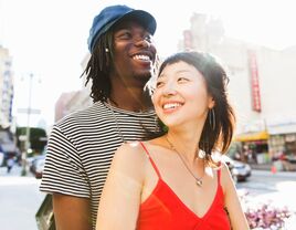 Couple on city street.