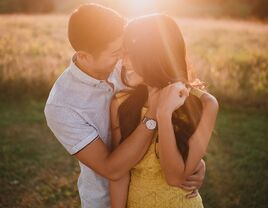 Outdoor engagement photo shoot at sunset