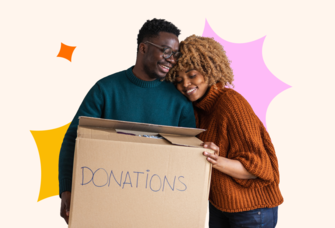 Couple with charity donation box