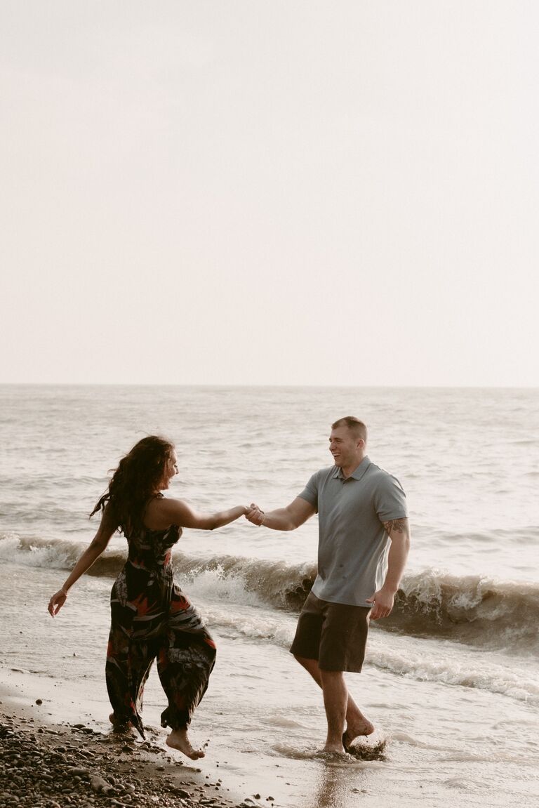The day he proposed!

Soon after meeting Eddie, I took him to my favorite spot. It quickly became our annual beach trip for his birthday that I cherished. 
Edward - this day in particular took some convincing Henna to go out due to the smog and weather advisory.  We went to dinner and straight to the beach to look for rocks like we always do. While Henna was looking for rocks she didn’t realize Edward had already found the perfect one. When she turned around he was on one knee. After a quick tackle and tears we were engaged and smiling ear to ear. 

