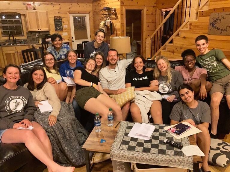 John "officially" asked Isabel to be his girlfriend at a Newman Leadership Retreat.