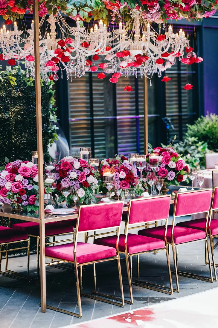 Crystal chandeliers decorated with red roses