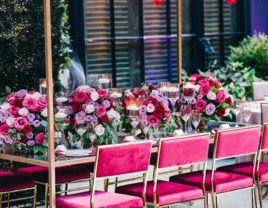 Crystal chandeliers decorated with red roses