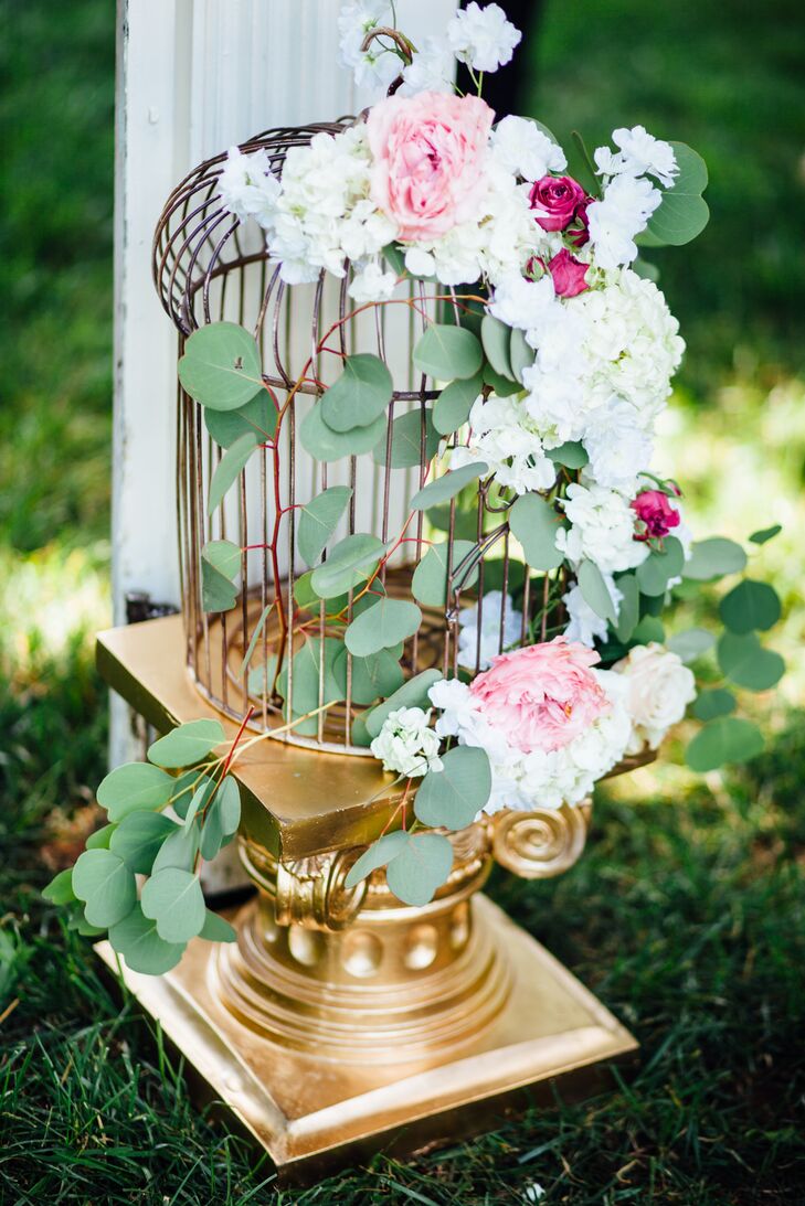 Gold Birdcage With Fresh Flowers And Eucalyptus