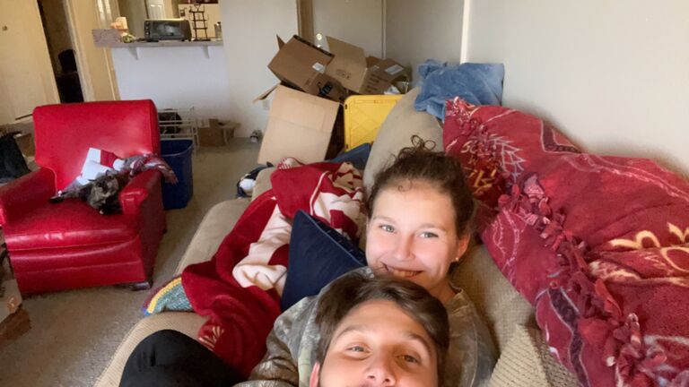 After Stephanie basically moved into Abe's bachelor pad, it was time to furnish and get a nicer apartment. This is them in their new apartment! (Kitty is lounging in the red chair)