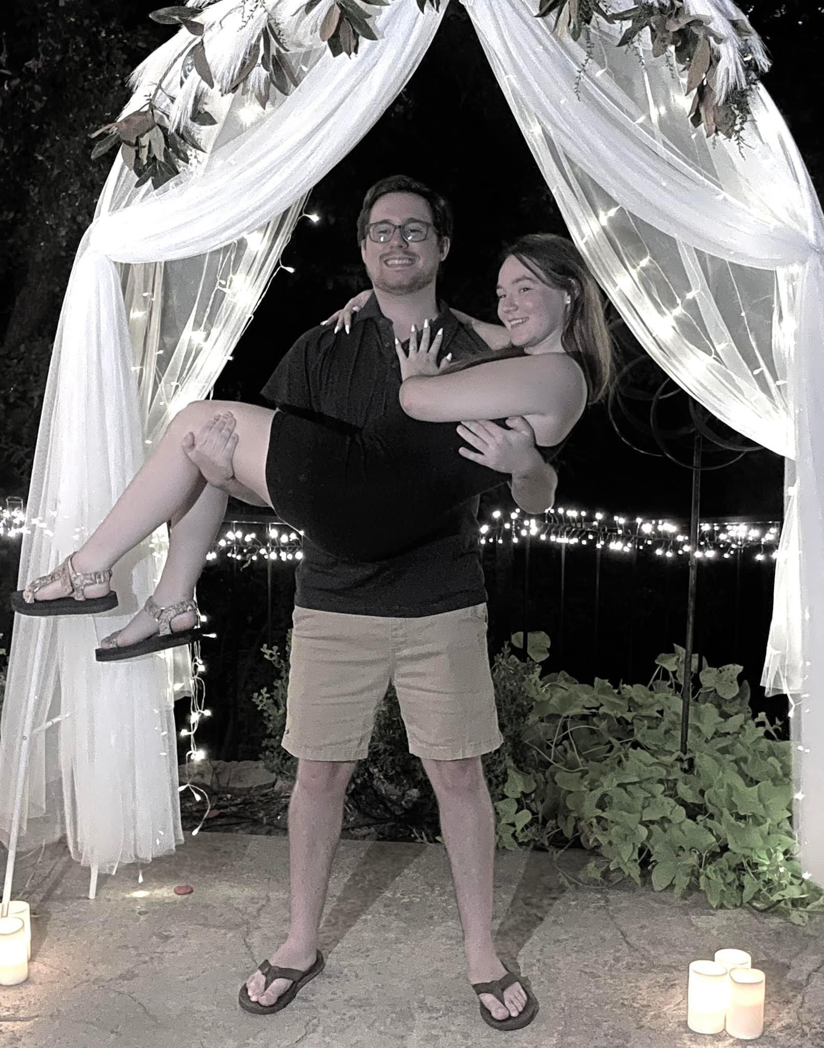 He proposed! It was an intimate setting surrounded by the couples family members 