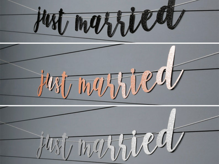 'just married' banner in silver, rose gold and black sparkly script