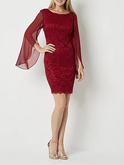 A red sequin mini dress with scalloped hem, lace and sequins all over, and flowy mesh sleeves from JCPenney