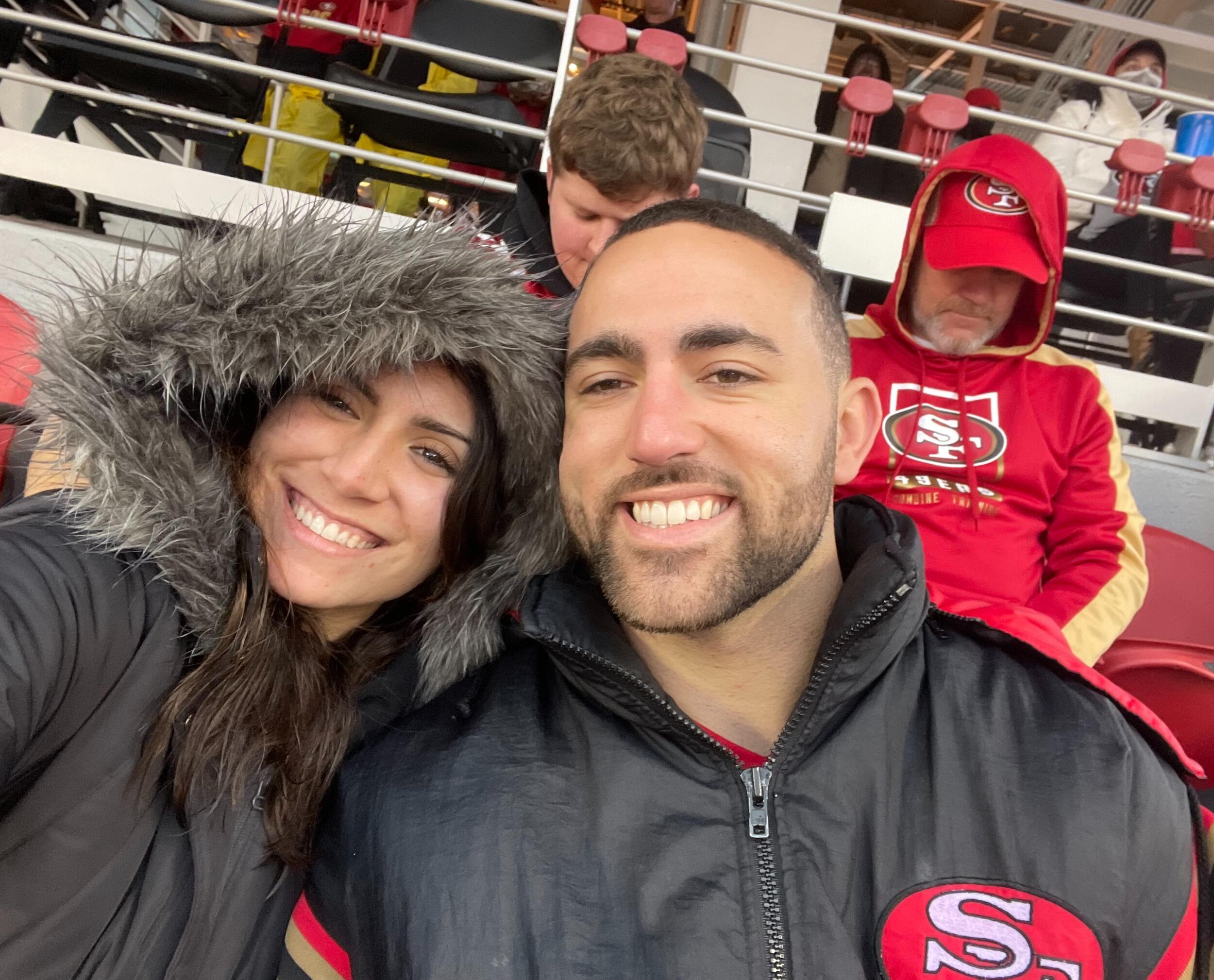 Rachel and John attend their first 49er game together. Go Niners!