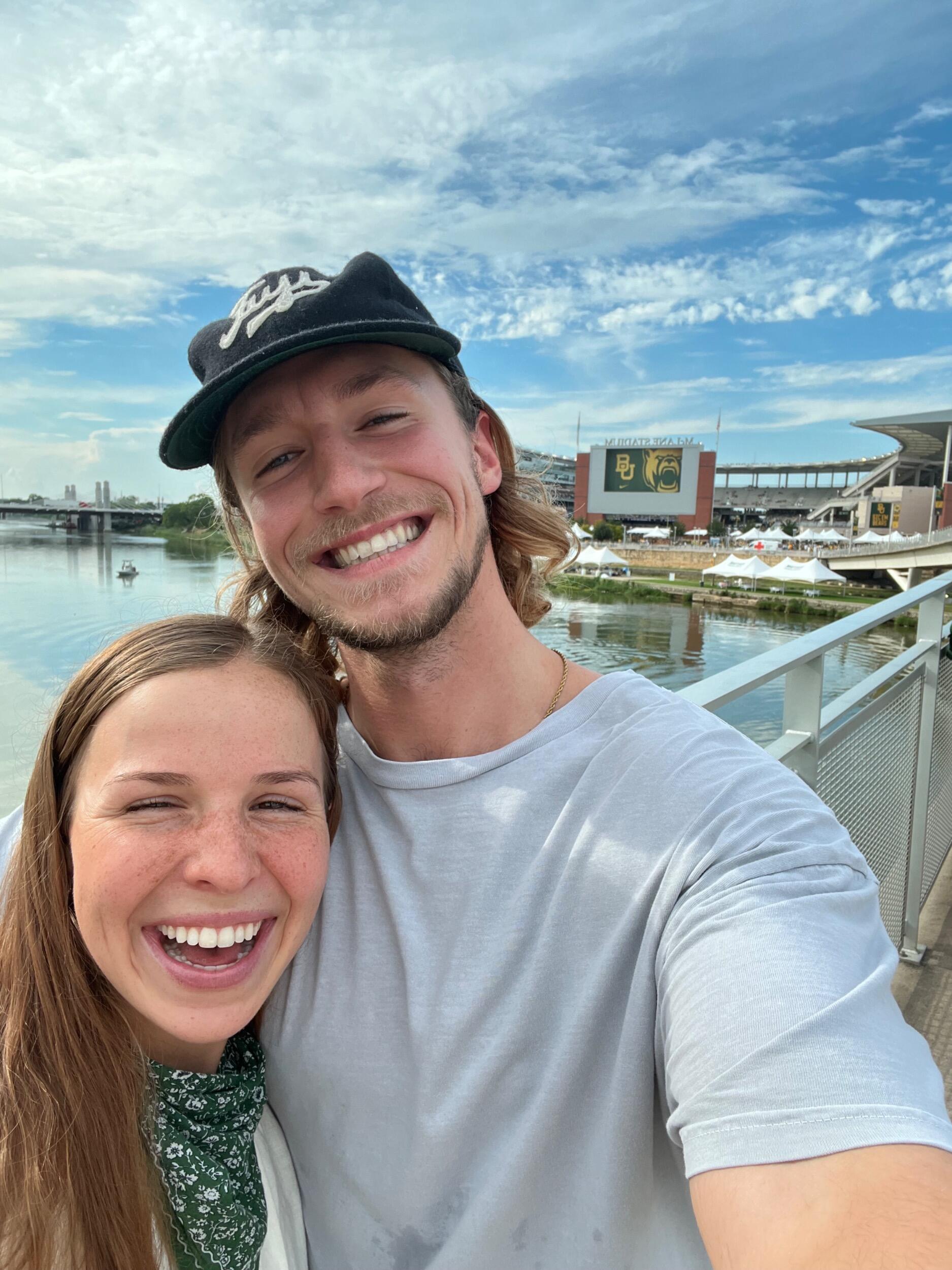 Emma bring Everett to his first Baylor game. Everett sweats profusely.