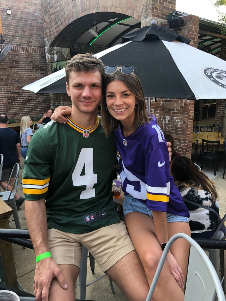 We met in optometry school in 2020. Despite being fans of rival football teams, we started dating in October of 2021!