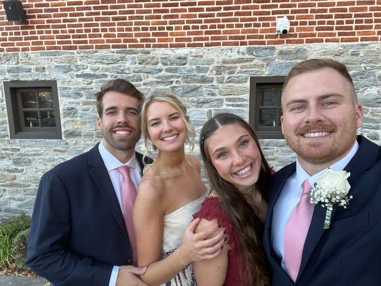 With friends at their first wedding together.
