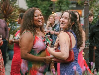 wedding guests laughing and having good time