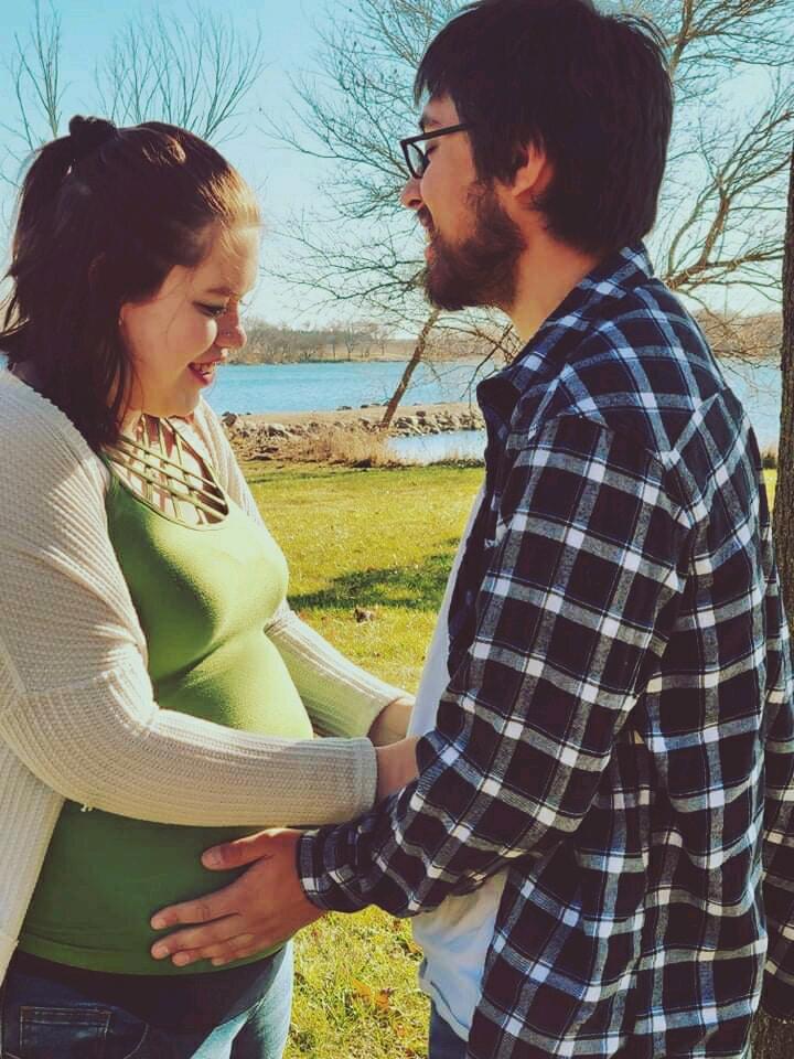 Here we went to Swan lake and my grandma (Janice) and aunt Chris took our maternity pictures. I remember it was so cold and I kept hiding in Cody's flannel lol