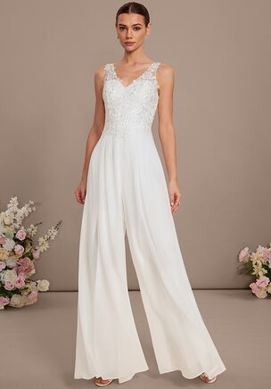 Fall in love with the JJ's House Aurae Lace Wedding Jumpsuit! A timeless and elegant design crafted to make your dream wedding a reality. Shine with confidence as you walk down the aisle.