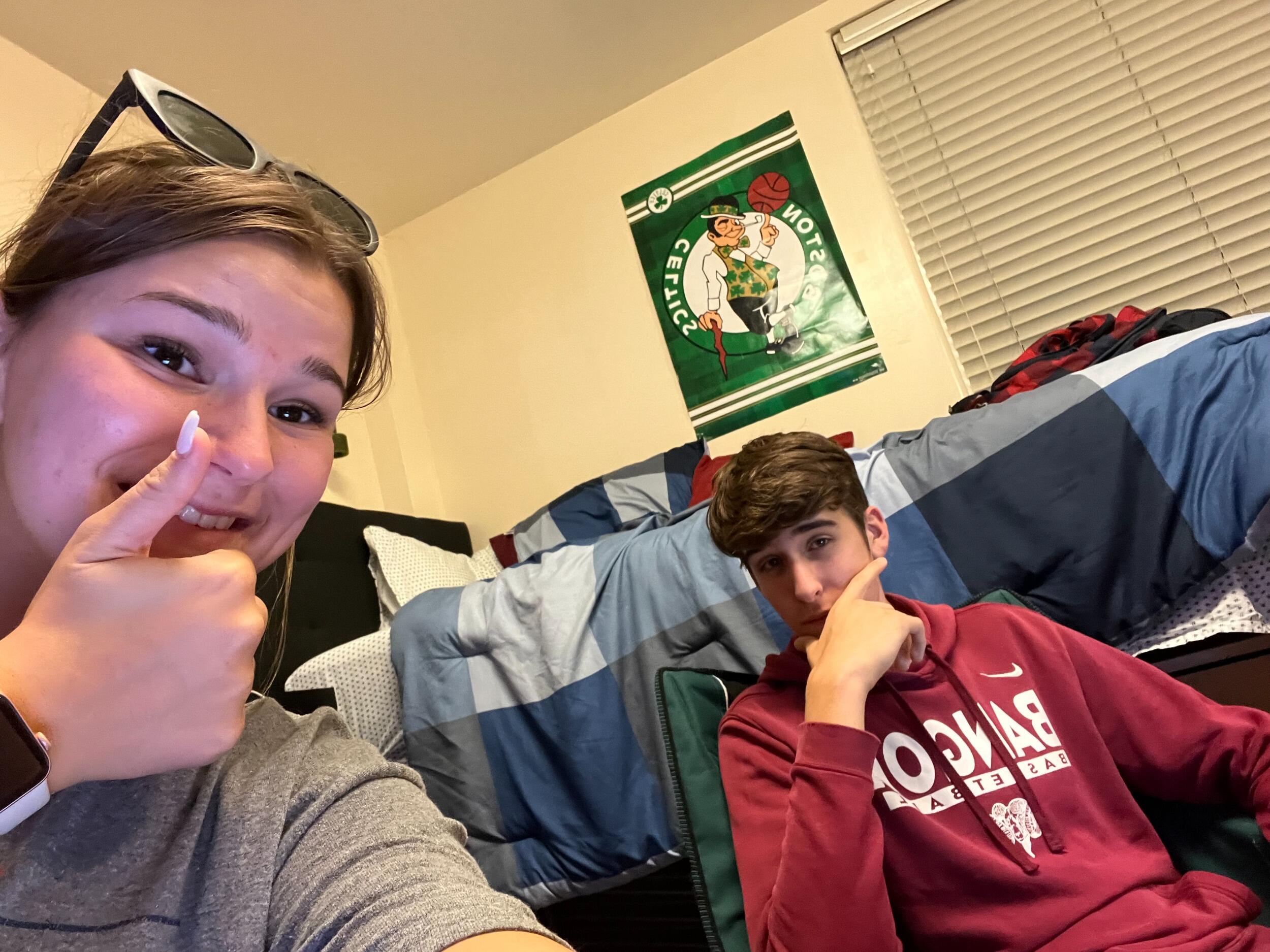 Eileen was working on her portfolio for her Campus Rec interview when Colby saw her in the library.  He stopped to say hi, and they agreed to hang out to work on homework and later a fantasy football draft.