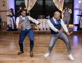 grooms on the dance floor