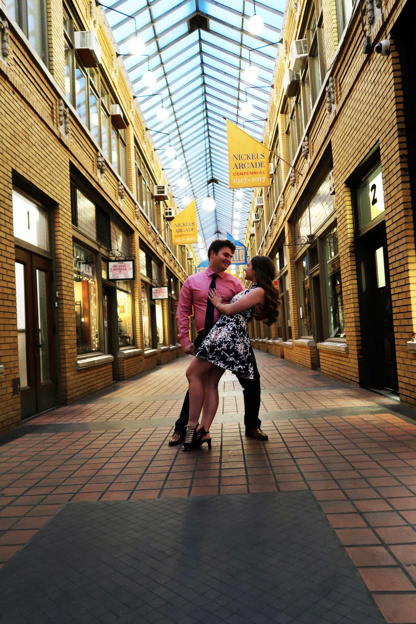 Abbey and Nick get engaged at Nickels Arcade in Ann Arbor. 
