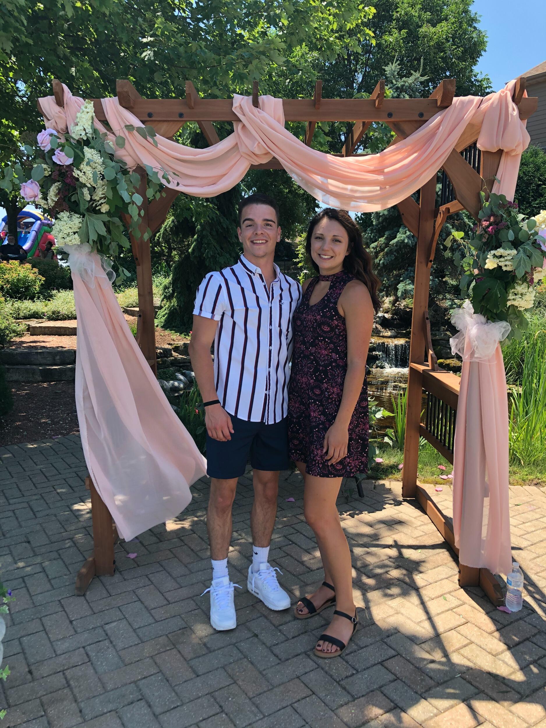 Our first official picture together at his mom's wedding!