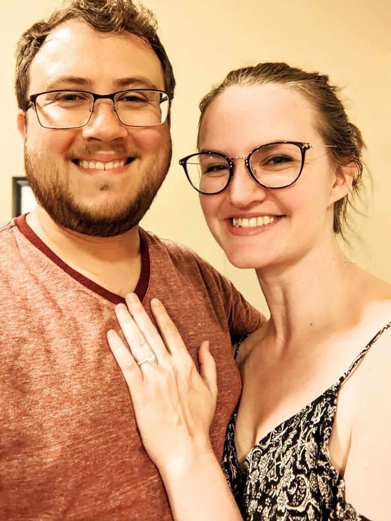 David proposed, Becca said yes!
Throwback to some of their early dates during COVID, they found out they enjoyed cooking for each other since going out to eat was not an option. David once offered to make curry for dinner and Becca joked she might propose if he made her Indian food. Fast forward a couple years, and he drops down to one knee after preparing curry and naan saying "now that I have made you Indian food, will you marry me?"