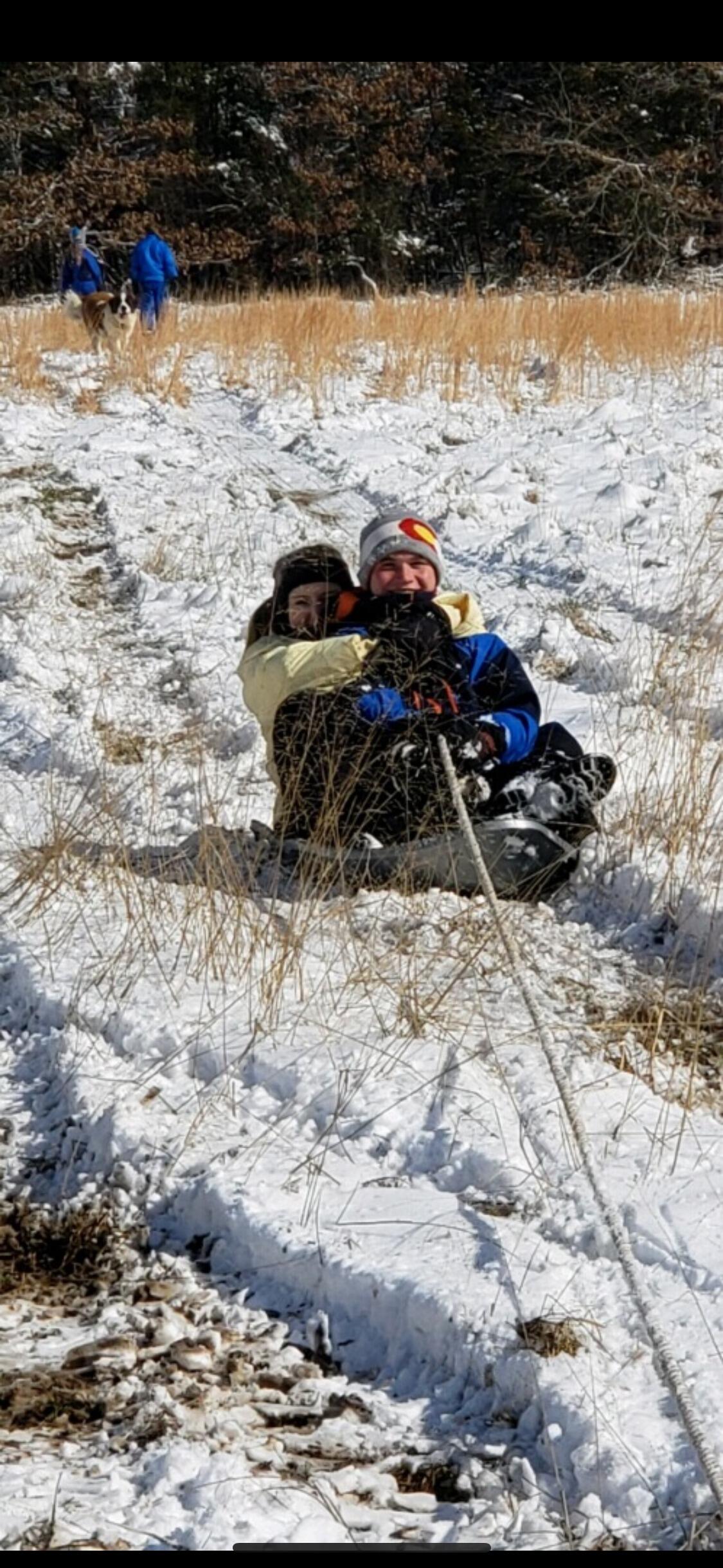 Sledding in the field! We really do have wonderful memories there! 