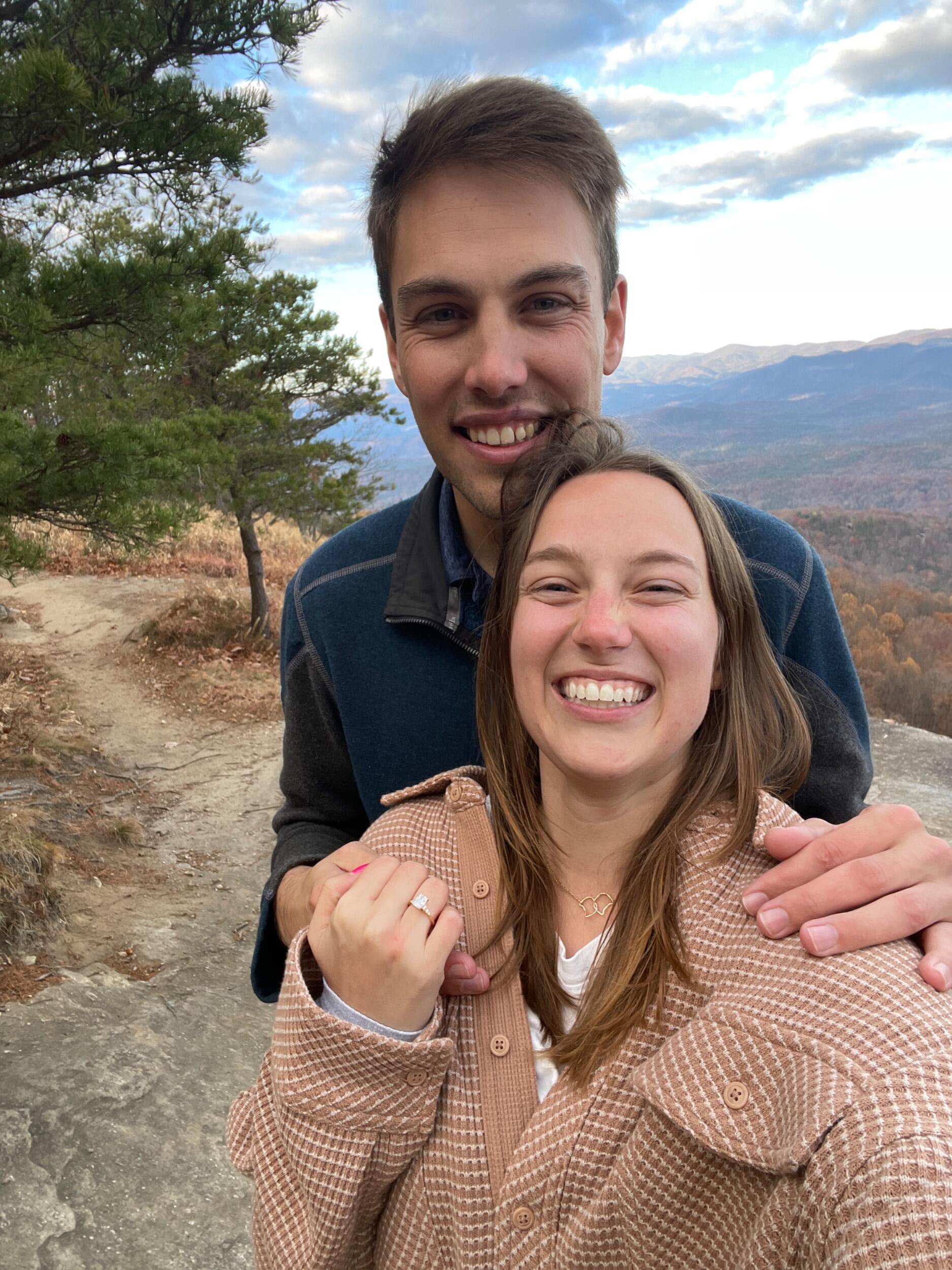 Engaged after a hike to the top of Yonah Mountain for sunrise