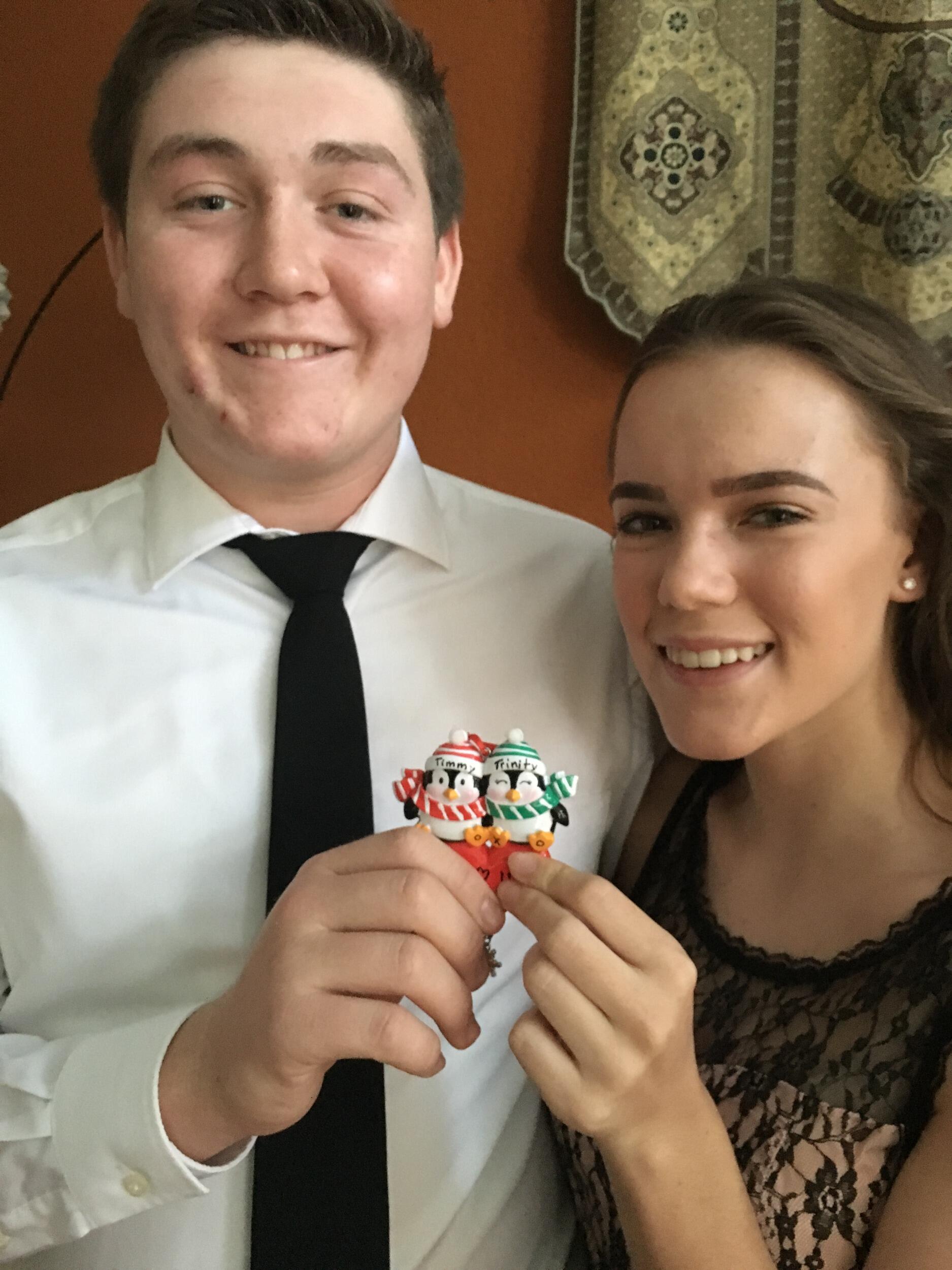 Our first Christmas together. Tim and Trinity exchange these ornaments every year. 