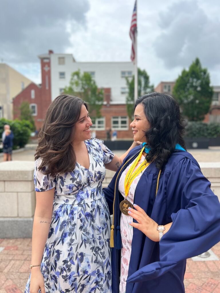 Rebecca graduates with her Master's degree from GW--something she could have never done without Michelle's support and encouragement. 
