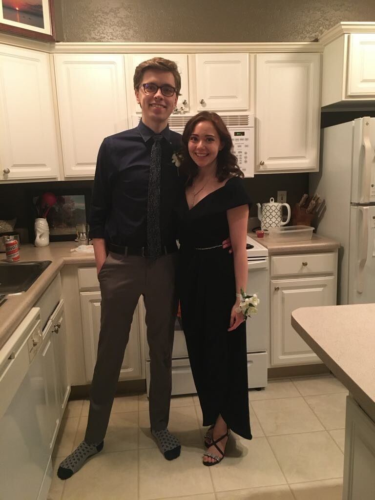 Our first actual photo together, about 5 months after meeting. Getting ready for a vet school formal!