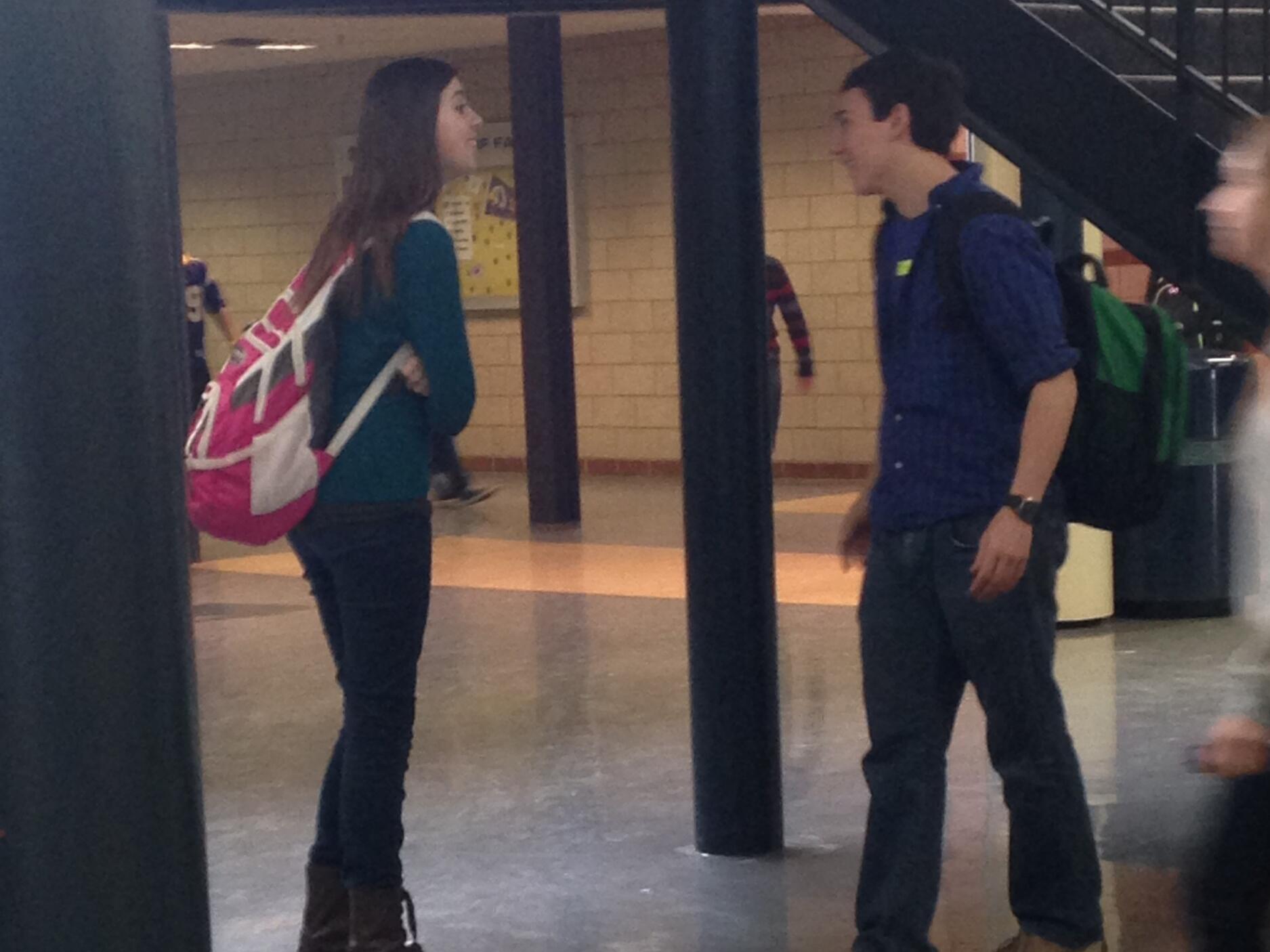 We both attended Chaska High School and had quite a few classes together. We got to know each other better in math class and would work on problems together with our friends. At some point my friends took this picture to tease me for talking to a cute boy between classes.