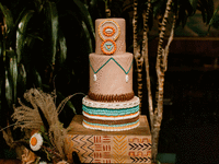 African sunset inspired wedding cake for vegan wedding menu.