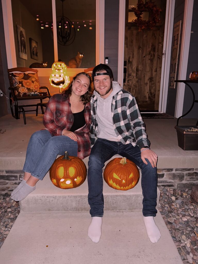 First carving pumpkins together