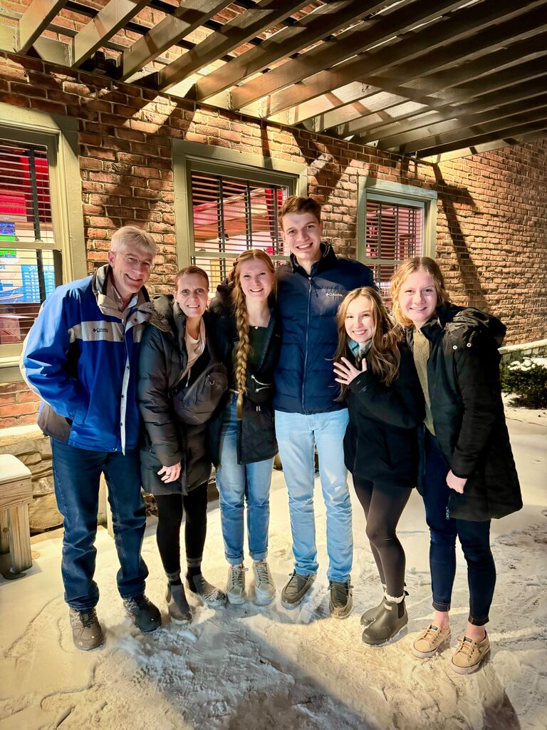 Jake planned a family dinner at Logan's Roadhouse to celebrate. The Berkenpas Family now has a new shortest member of the family. 