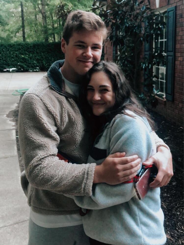 Will and I met in high school at track practice for shot put. We talked for a month before Will asked me to be his girlfriend!