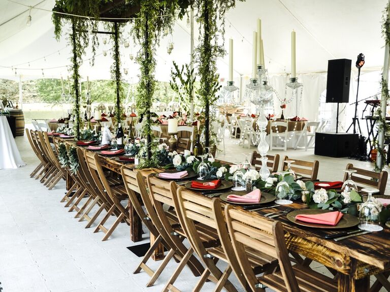 Event tent reception space with hanging foliage