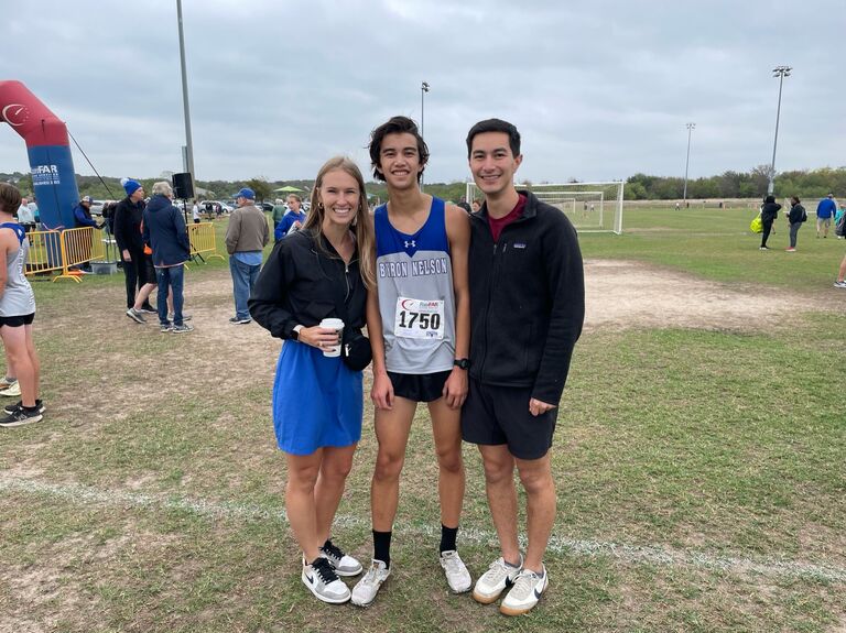 This is a really special photo to me. I love my brother Isaac and took the day off work to go see him run a high school cross-country race. Many years ago (2010), I ran cross-country at this same high school and Isaac was about 2 years old. There's an old picture of my dad carrying Isaac as a baby while they cheer me on at my very first race. So many years later I get to show up to HIS race and see Isaac running for the same team! Ryann was so gracious to come out and cheer Isaac on with me. She loves my family really well.  - Adam



I remember watching Adam running with Isaac cheering him on (me carrying my Starbies trying to keep up) and thinking, he is going to be a phenomenal dad one day! -Ryann 