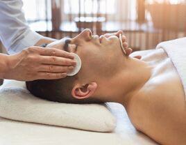 Groom getting facial