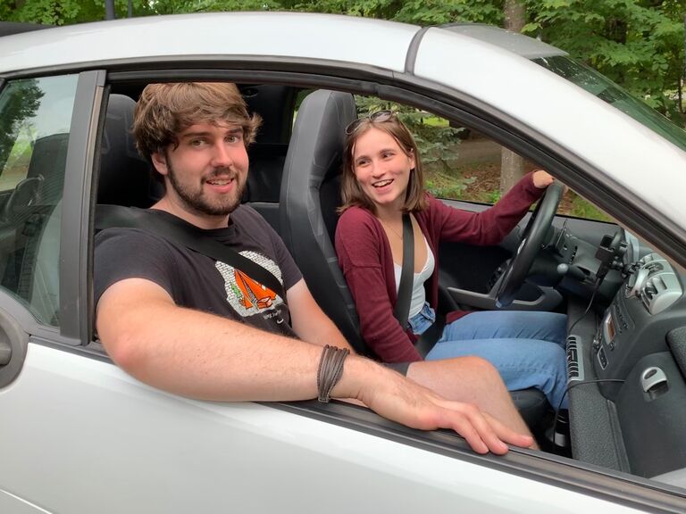 Sean and Chloe in the new (to them) Smart Car! (Also Chloe's first car, which Sean taught her to drive on)