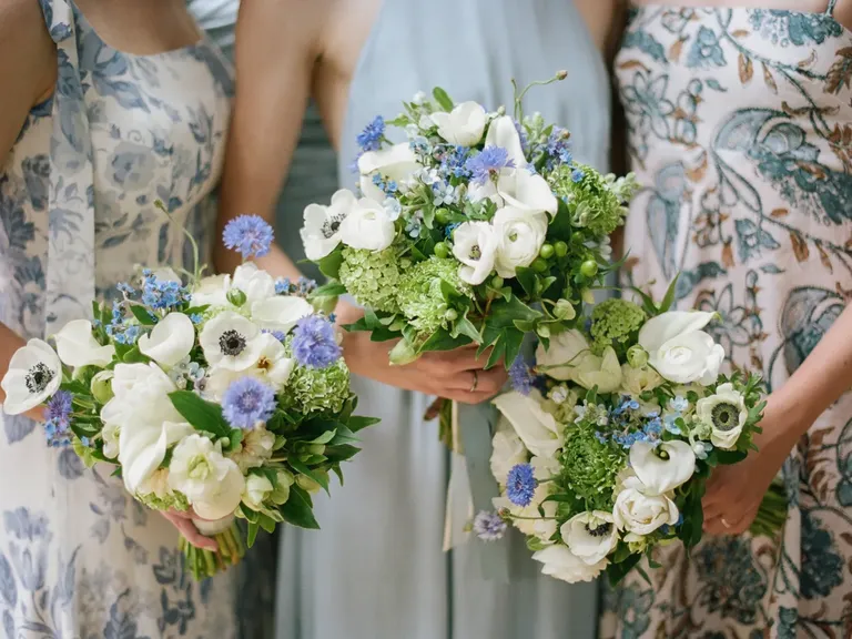 Blue and white bridesmaid bouquets, taylor swift themed wedding 